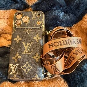 Louis Vuitton Brown Monogram Phone Case with Gold Accents